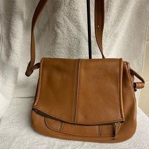 Boots and saddle leather bag